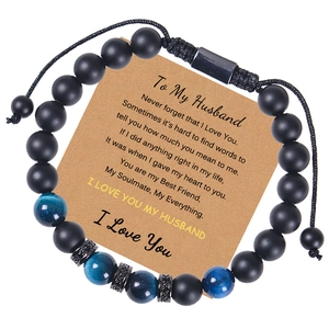 Detail of matte tiger eye bracelet with sentimental greeting card for husband