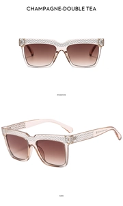 Detailed views of luxury champagne oversized sunglasses with sparkling rhinestone accents