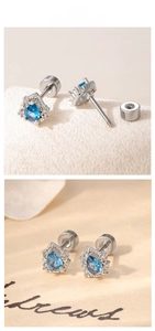 Detailed macro view of blue teardrop zircon earrings with secure silver screw-back studs