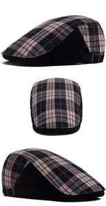 Plaid newsboy cap with corduroy panels and adjustable gold buckle detail view