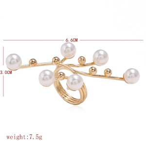 Detail view of gold geometric pearl ring with dimensions 6.6cm by 3.0cm and 7.5g weight