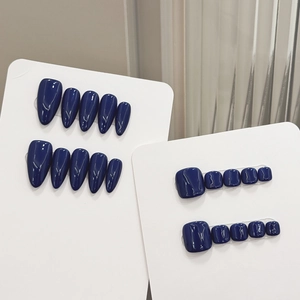 Glossy navy blue press-on nail set for fingers and toes with a high-shine mirror finish