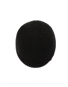 Overhead view showing the vertical ribbed knit texture of a thick black winter beanie