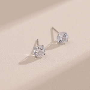 Classic round brilliant AAA cubic zirconia stud earrings with four-prong silver steel base
