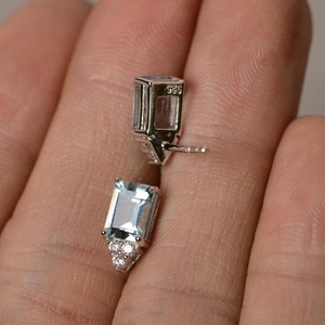 925 silver stud earrings with rectangular blue topaz and tiny round white diamonds