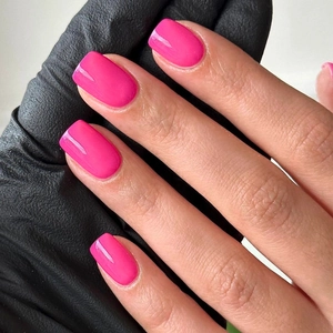 Glossy rose red press-on nails in short square shape with high-shine mirror finish