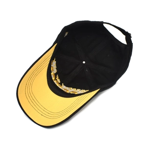 Detailed interior of a cotton baseball cap showing reinforced seams and sweatband lining
