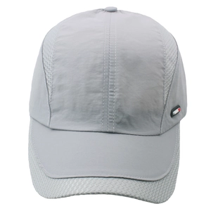Detail of light gray quick-dry baseball cap with breathable mesh and side logo patch