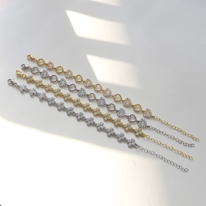 Elegant brass clover and heart bracelets with zircon stones in gold and silver finish