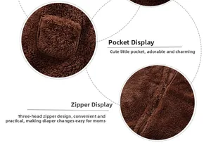 Detail of baby winter romper showing high-quality plush fabric and triple zipper system