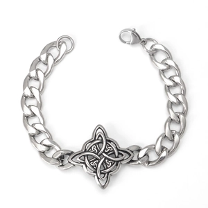 Close-up of stainless steel Cuban chain bracelet with a Celtic Witch's Knot charm