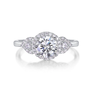 Detailed view of sterling silver moissanite ring with a classic halo setting and side stones