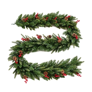Lush snow-flocked Christmas garland with green PE needles, pine cones, and red berries