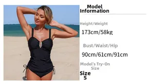 Detail of black tankini featuring metal U-ring detail, pleated tummy control and side drawstrings
