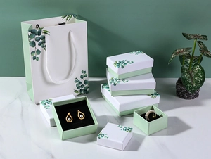 Eucalyptus jewelry gift boxes set with gold pearl earrings and ring on black lining