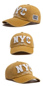 Détails d'une casquette de baseball en coton délavé jaune moutarde avec broderie NYC rétro