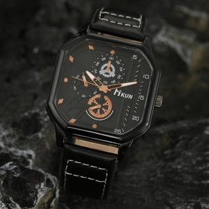 Men's black octagonal sport watch with leather strap and rose gold markers