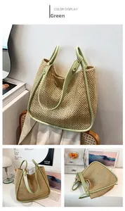 Detail of light green straw tote bag showing woven texture and PU leather handles