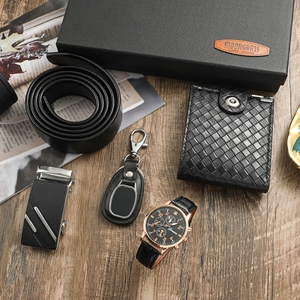 Business gift set for men featuring watch, belt, wallet, and keychain in a premium box