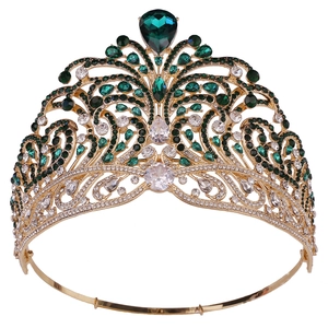 Luxury gold tiara with emerald green crystals and teardrop gemstone for pageant pageant