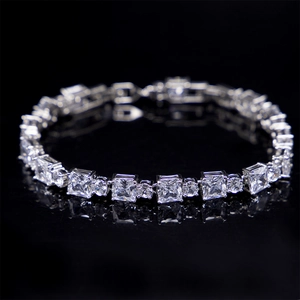 Silver geometric bracelet featuring alternating square and round AAA zircon stones