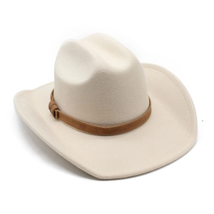 Detail view of cream western cowboy hat with brown leather band and curved felt brim