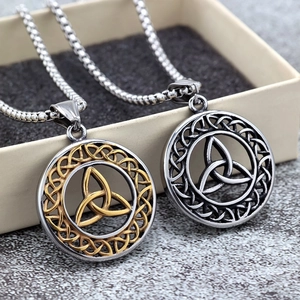 Vintage unisex stainless steel Celtic knot pendants in silver and gold in a gift box