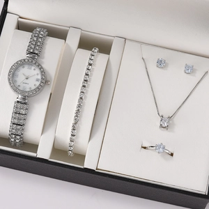 Elegant silver quartz watch set for women with matching necklace, bracelet and ring