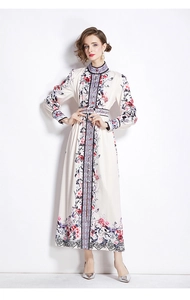 Detail of floral printed maxi dress featuring stand collar and vintage button closure
