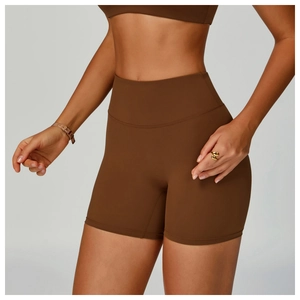 Close-up of high-waist fitness shorts in dark cocoa brown with seamless fabric details