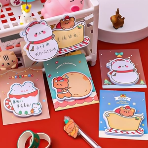 Cartoon Christmas sticky notes featuring snowman and bear designs for festive memos