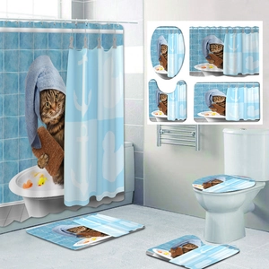 Detail of 4-piece bathroom set with cute cat bath print and matching non-slip mats