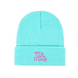 Green knit beanie with pink 'You are Good' embroidery on a ribbed casual winter hat