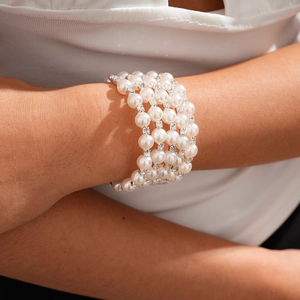 Detail of five-layer baroque pearl bracelet with sparkling silver rhinestone spacers