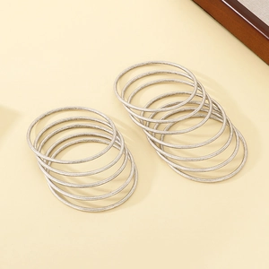 Detail of 3mm antique silver stainless steel bracelets with brushed matte texture