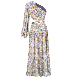 Detail of waist cutout with metal chain on floral one-shoulder maxi dress
