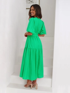 Elegant emerald green tiered maxi dress with puff sleeves and deep V-neck for women