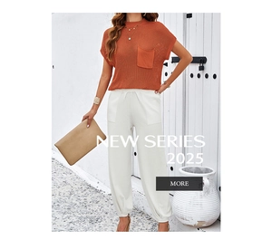 Detail of a two-piece set featuring a knit orange top and white drawstring joggers