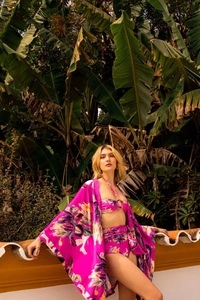 Detailed view of magenta tropical floral bikini set with matching satin kimono cover-up