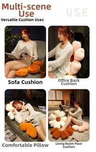 Detail of soft plush flower cushions used as decorative sofa pillows and seat pads