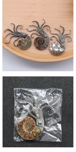 Detailansicht der Kraken-Tentakel und Nautilus-Schalenstruktur des Schmuckstücks