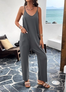 Combinaison gris foncé sans manches à col en V avec de grandes poches et coupe ample