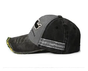Detail of vintage baseball cap with Jamaica embroidery and distressed brim edge texture