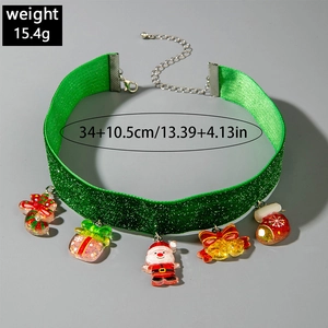 Detail of Christmas choker featuring green glitter lace and five festive charms weight 15.4g