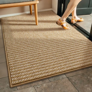 Close-up of beige woven texture bath mat with anti-slip surface and durable fiber detail