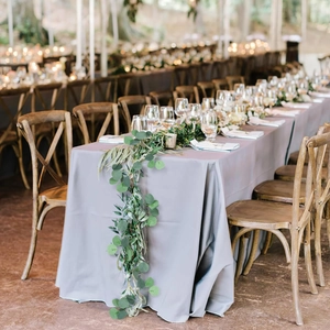 Elegant artificial eucalyptus garland centerpiece for a romantic wedding table decoration