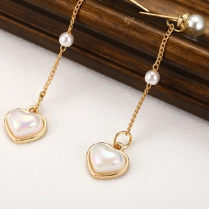 French vintage heart earrings with long gold chain tassels and white pearls