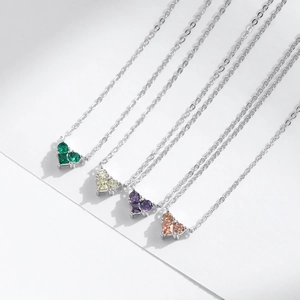 Elegant S925 sterling silver heart necklaces with colorful gemstones in four vibrant colors