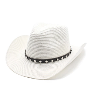 Classic white woven cowboy hat with black studded band and wide brim against white background