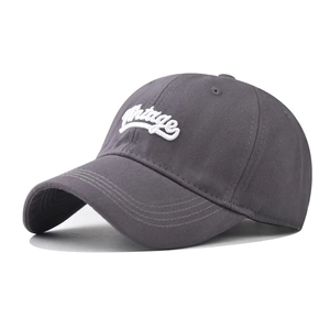 Detail of grey cotton vintage baseball cap with white 3D embroidery and reinforced stitching